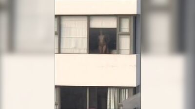 Asian Fucking beside the window