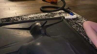 CUTE GIRL IN LATEX VACBED CUMS OVER AND OVER