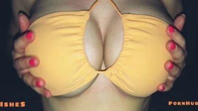 Titfuck in a swimming pool bra